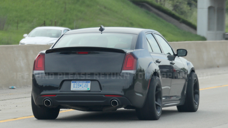Illustration for article titled What The Hell Is This Widebody Chrysler 300 SRT With Dodge Demon Wheels?